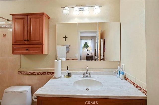 21332 Silver Spur Ln, Wildomar, CA 92595 - bathroom featuring vanity and tile walls
