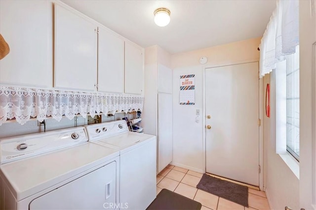 21332 Silver Spur Ln, Wildomar, CA 92595 - washroom featuring washing machine and clothes dryer, light tile patterned floors, and cabinet space