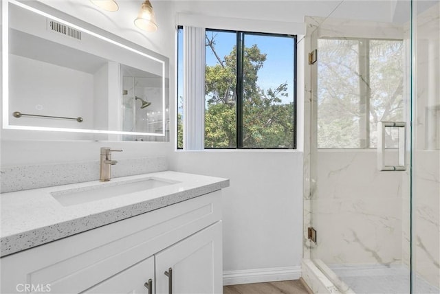 13104 Glen Ct Unit 28, Chino Hills, CA 91709 - full bathroom featuring a marble finish shower and vanity