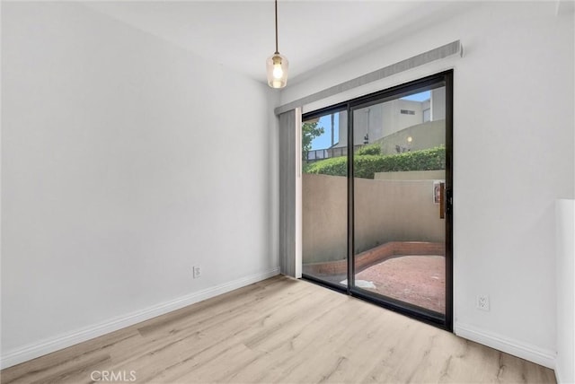 13104 Glen Ct Unit 28, Chino Hills, CA 91709 - spare room featuring wood finished floors and baseboards