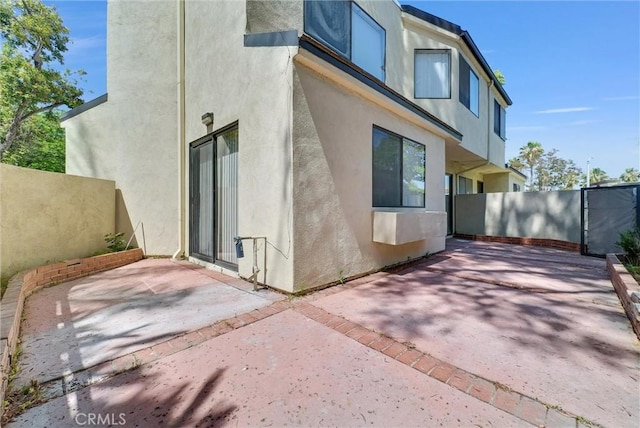 13104 Glen Ct Unit 28, Chino Hills, CA 91709 - view of property exterior with a patio and stucco siding