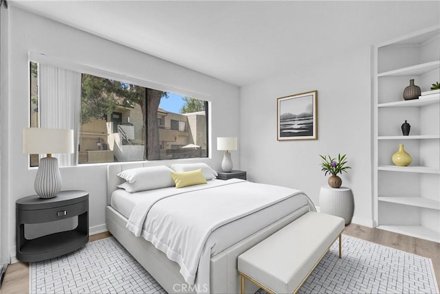 13104 Glen Ct Unit 28, Chino Hills, CA 91709 - bedroom with light wood-type flooring