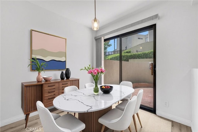 13104 Glen Ct Unit 28, Chino Hills, CA 91709 - dining space with light wood-style flooring and baseboards