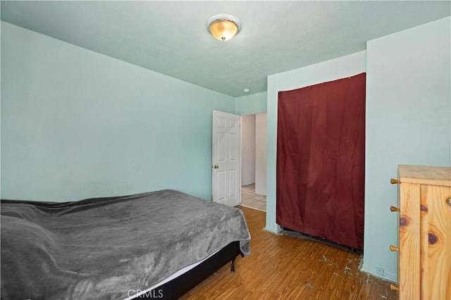 38614 Puerta Ave, Palmdale, CA 93550 - bedroom featuring wood finished floors and a closet