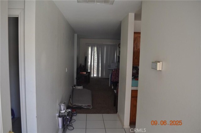 11584 Oak St, Apple Valley, CA 92308 - hall with tile patterned flooring and carpet