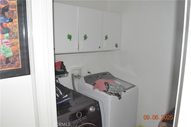 11584 Oak St, Apple Valley, CA 92308 - washroom with cabinet space and washer / clothes dryer