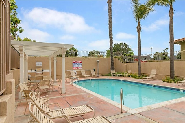 8308 Atlanta Ave Unit 101, Huntington Beach, CA 92646 - community pool featuring a pergola, a patio, and a grill