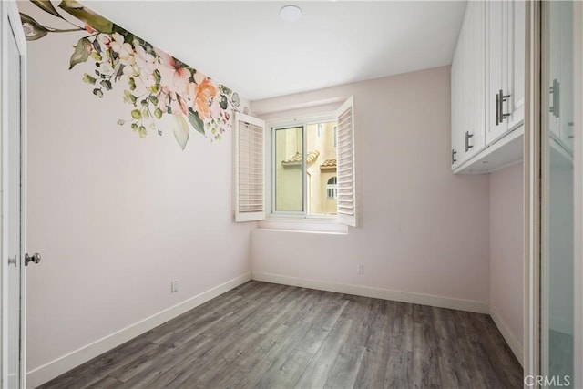 8308 Atlanta Ave Unit 101, Huntington Beach, CA 92646 - empty room featuring wood finished floors and baseboards