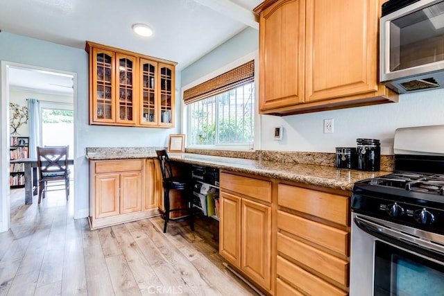 1666 Albany Ct, Claremont, CA 91711 - kitchen with appliances with stainless steel finishes, light wood-style flooring, glass insert cabinets, and light stone countertops
