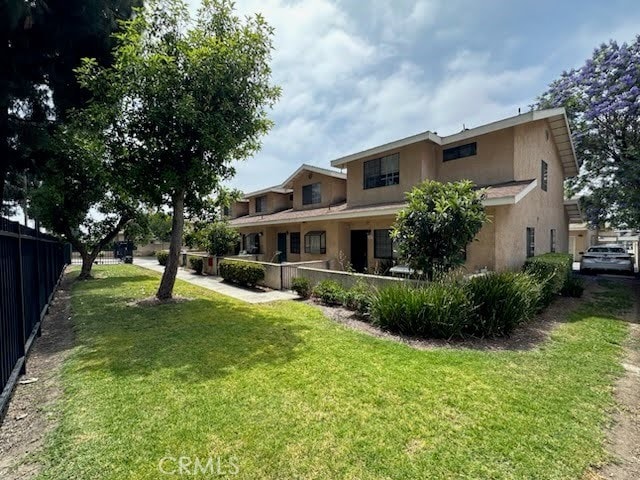 1034 E 6th St Unit 102, Ontario, CA 91764 - back of property with stucco siding