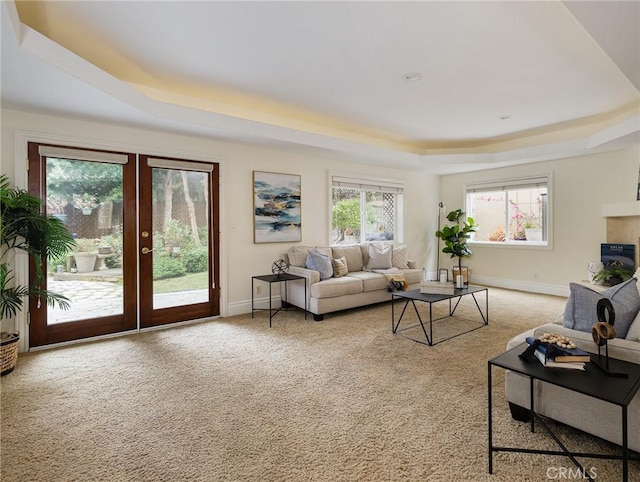 120 Via Alameda, Redondo Beach, CA 90277 - living area with a raised ceiling, french doors, carpet floors, and a glass covered fireplace