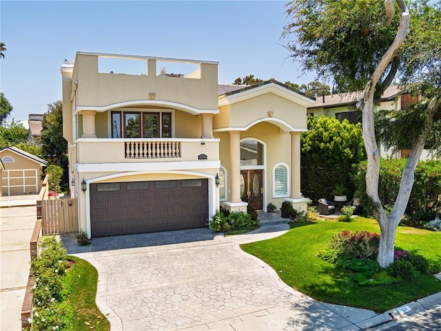 120 Via Alameda, Redondo Beach, CA 90277 - mediterranean / spanish-style house with a balcony, a garage, concrete driveway, and stucco siding