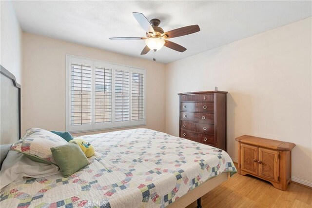 1257 N Brookhurst St, Anaheim, CA 92801 - bedroom featuring light wood-style flooring, ceiling fan, and baseboards