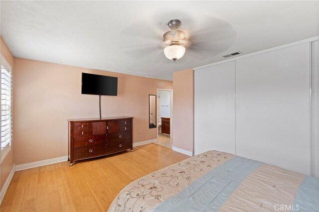 1257 N Brookhurst St, Anaheim, CA 92801 - bedroom with wood finished floors, baseboards, a closet, and ceiling fan