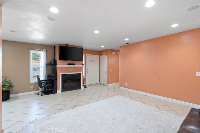 1257 N Brookhurst St, Anaheim, CA 92801 - unfurnished living room featuring light tile patterned floors, recessed lighting, a fireplace, and baseboards
