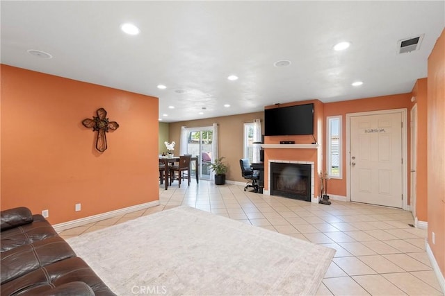 1257 N Brookhurst St, Anaheim, CA 92801 - living area with recessed lighting, light tile patterned floors, baseboards, and a tiled fireplace