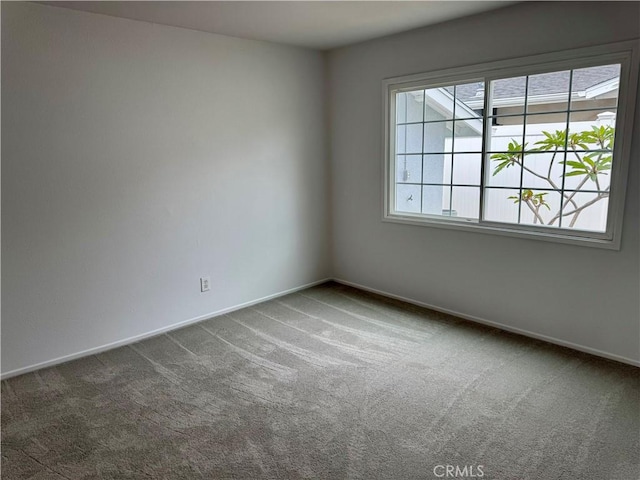 959 Post Rd, Costa Mesa, CA 92626 - spare room featuring carpet flooring and baseboards