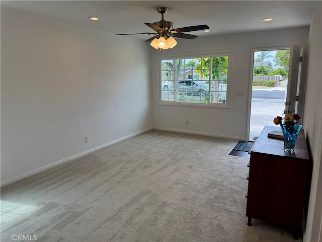 959 Post Rd, Costa Mesa, CA 92626 - unfurnished dining area featuring light colored carpet, healthy amount of natural light, baseboards, a ceiling fan, and recessed lighting