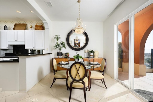 11 Classico Dr, Newport Coast, CA 92657 - dining room with a chandelier and arched walkways