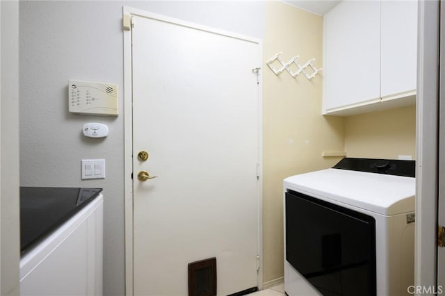 11 Classico Dr, Newport Coast, CA 92657 - laundry room featuring cabinet space and washing machine and dryer
