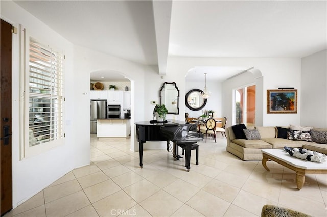 11 Classico Dr, Newport Coast, CA 92657 - living area with arched walkways, a chandelier, and light tile patterned floors