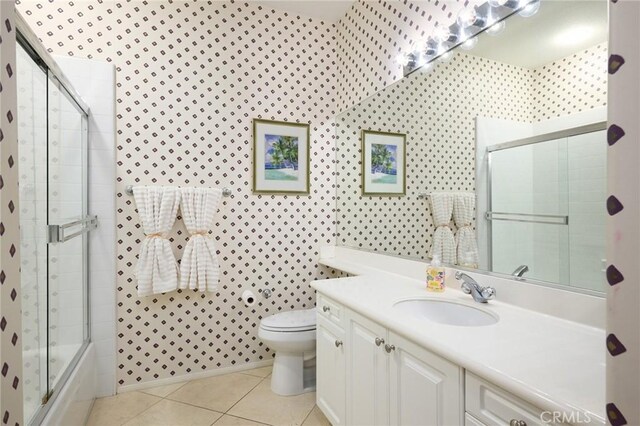 11 Classico Dr, Newport Coast, CA 92657 - full bathroom with vanity, tile patterned floors, and combined bath / shower with glass door