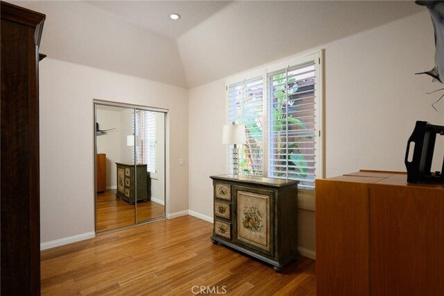 11 Classico Dr, Newport Coast, CA 92657 - bedroom featuring lofted ceiling, wood finished floors, recessed lighting, and a closet