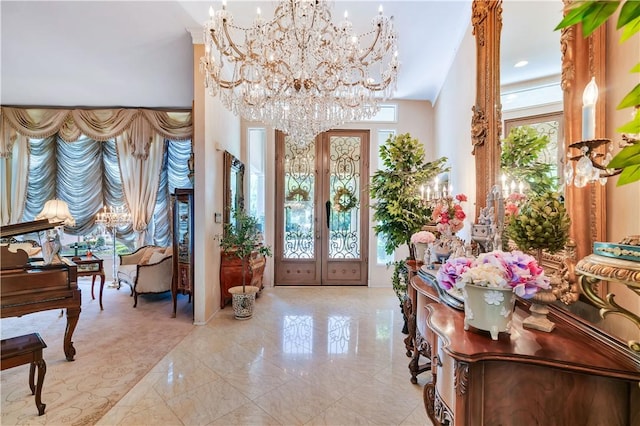 15850 Arbela Dr, Whittier, CA 90603 - entrance foyer with a chandelier, french doors, a towering ceiling, and marble tiled floors