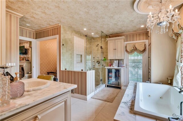 15850 Arbela Dr, Whittier, CA 90603 - bathroom featuring beverage cooler, a stall shower, a whirlpool tub, vanity, and ornamental molding