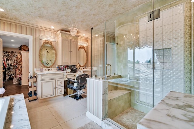 15850 Arbela Dr, Whittier, CA 90603 - bathroom with vanity, a shower stall, ornamental molding, recessed lighting, and a walk in closet