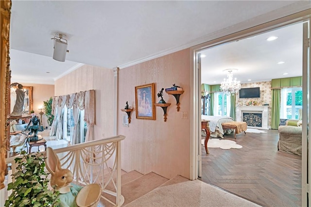 15850 Arbela Dr, Whittier, CA 90603 - hallway featuring plenty of natural light, a chandelier, crown molding, and recessed lighting