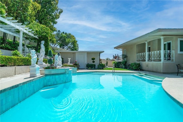 15850 Arbela Dr, Whittier, CA 90603 - view of swimming pool featuring an outdoor structure and a pool with connected hot tub