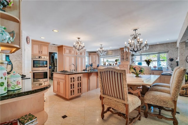 15850 Arbela Dr, Whittier, CA 90603 - dining space with a chandelier, recessed lighting, and light tile patterned floors