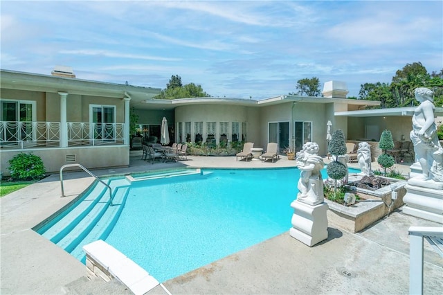 15850 Arbela Dr, Whittier, CA 90603 - outdoor pool with a patio area and french doors