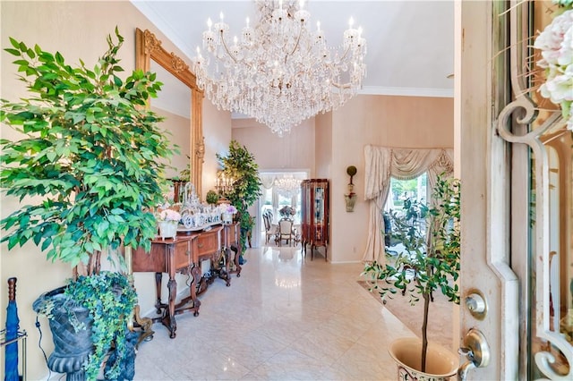 15850 Arbela Dr, Whittier, CA 90603 - foyer with a chandelier, crown molding, and a towering ceiling