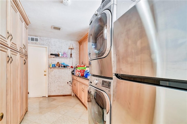 15850 Arbela Dr, Whittier, CA 90603 - washroom featuring stacked washer and clothes dryer and cabinet space