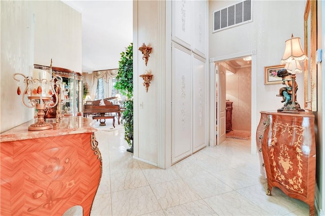 15850 Arbela Dr, Whittier, CA 90603 - corridor featuring a high ceiling and light marble finish floors