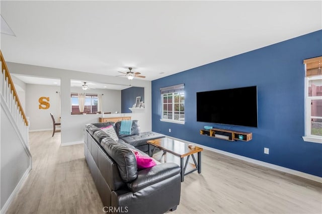 3822 Jupiter Ave, Lompoc, CA 93436 - living room featuring wood finished floors, stairway, and a ceiling fan