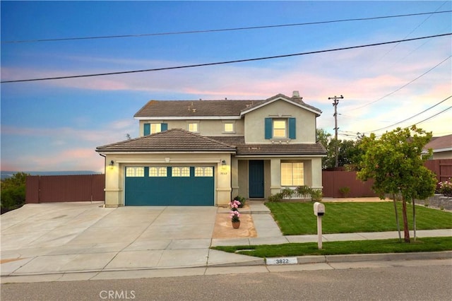 3822 Jupiter Ave, Lompoc, CA 93436 - traditional-style home featuring concrete driveway, an attached garage, stucco siding, and a tiled roof