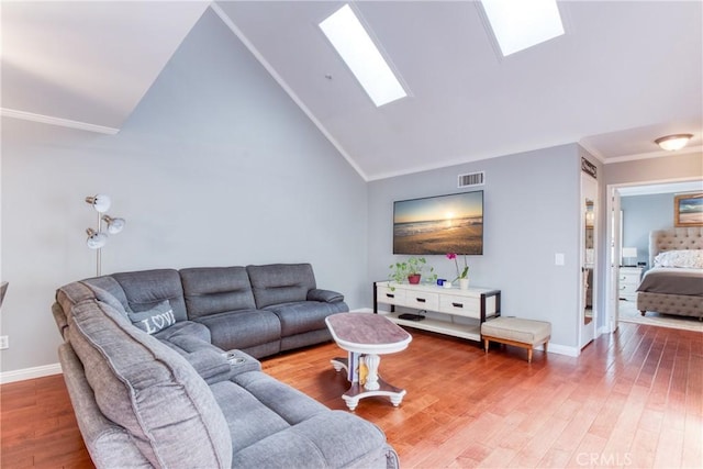 64 Seacrest Ct, Long Beach, CA 90803 - living area with a skylight, wood finished floors, crown molding, and high vaulted ceiling