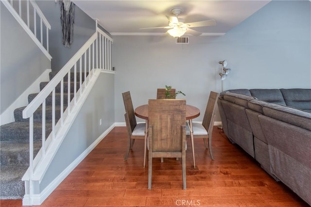 64 Seacrest Ct, Long Beach, CA 90803 - dining room featuring ceiling fan, wood finished floors, and stairway