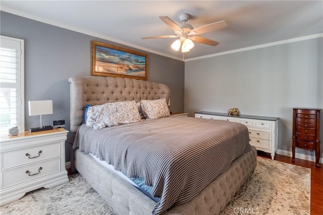 64 Seacrest Ct, Long Beach, CA 90803 - bedroom featuring multiple windows, ornamental molding, light wood-style flooring, and ceiling fan