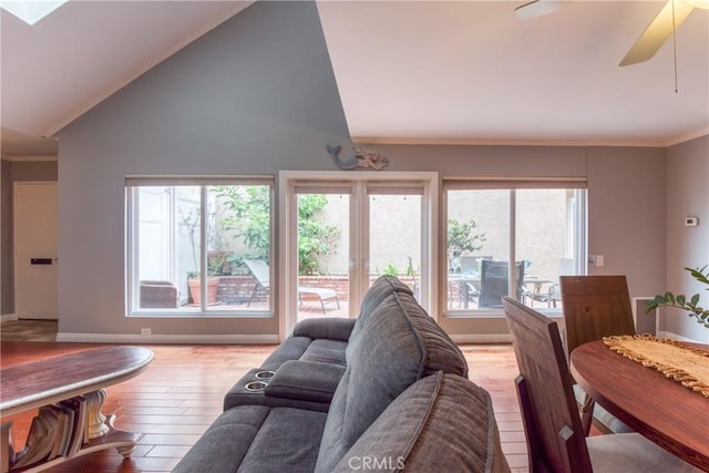 64 Seacrest Ct, Long Beach, CA 90803 - living room with light wood-style flooring, lofted ceiling, ceiling fan, and ornamental molding