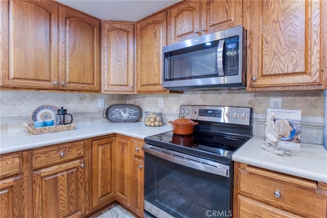 64 Seacrest Ct, Long Beach, CA 90803 - kitchen featuring stainless steel appliances and brown cabinets