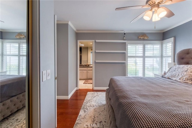 64 Seacrest Ct, Long Beach, CA 90803 - bedroom featuring dark wood-style floors, ornamental molding, and a ceiling fan