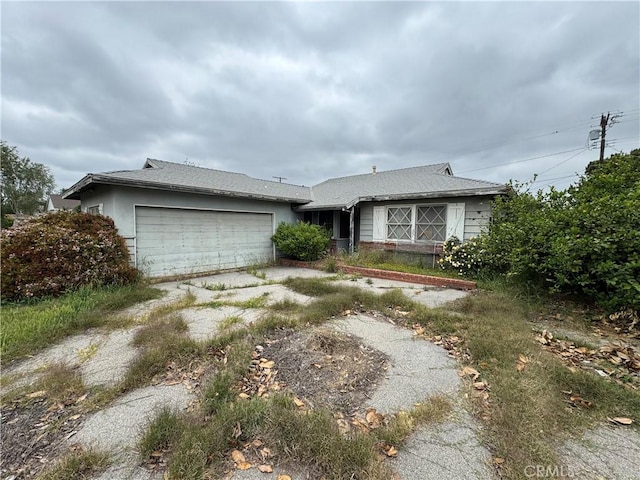 8015 Mcnulty Ave, Winnetka, CA 91306 - single story home featuring an attached garage, driveway, and stucco siding