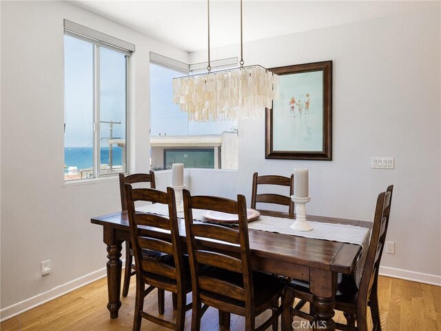 209 41st, Manhattan Beach, CA 90266 - dining space with baseboards and light wood finished floors