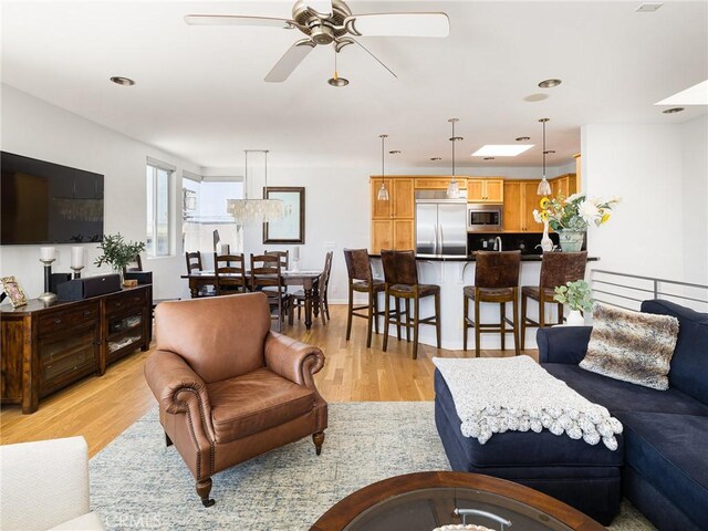 209 41st, Manhattan Beach, CA 90266 - living area featuring light wood finished floors, ceiling fan, and recessed lighting