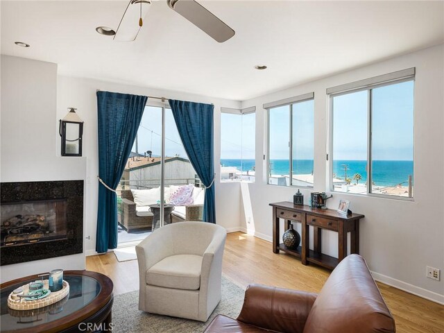 209 41st, Manhattan Beach, CA 90266 - living room with plenty of natural light, light wood-type flooring, ceiling fan, a water view, and recessed lighting