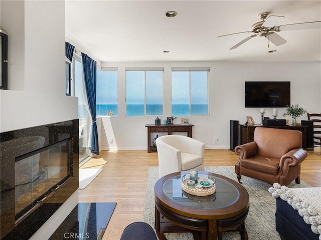 209 41st, Manhattan Beach, CA 90266 - living room featuring light wood-type flooring, a ceiling fan, recessed lighting, and a premium fireplace
